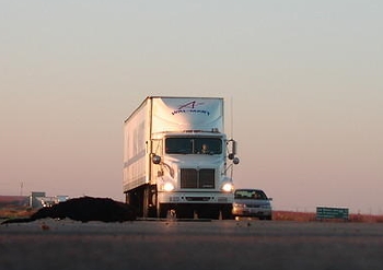 Truck driver complying with hours of service regulations